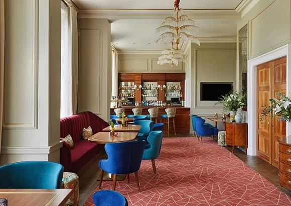 a room with tables and chairs