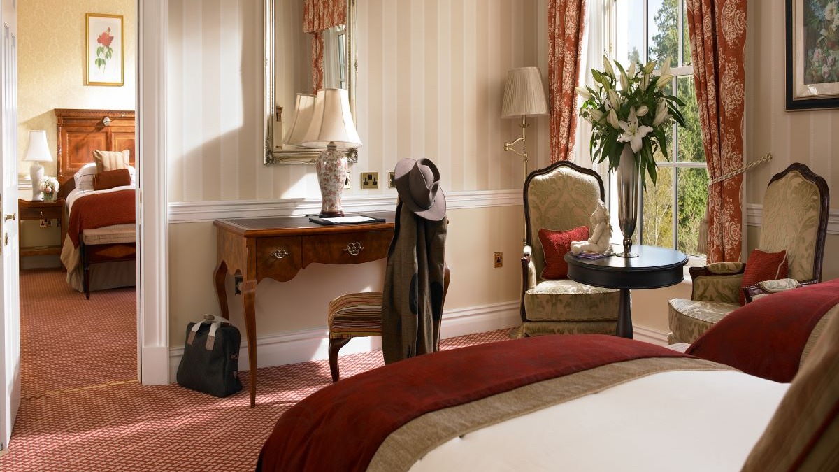 a room with a bed and a chair