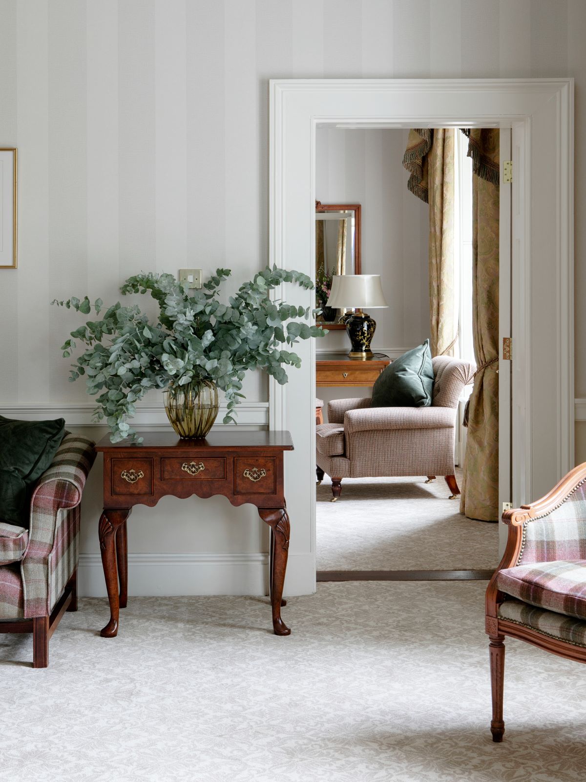 a room with a table and chairs