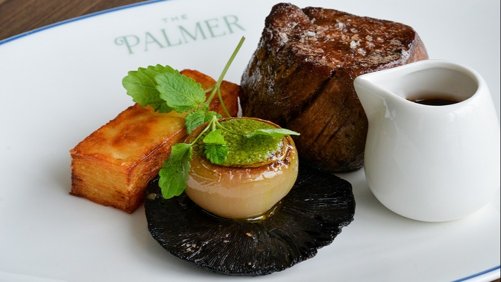a plate of food with a saucer