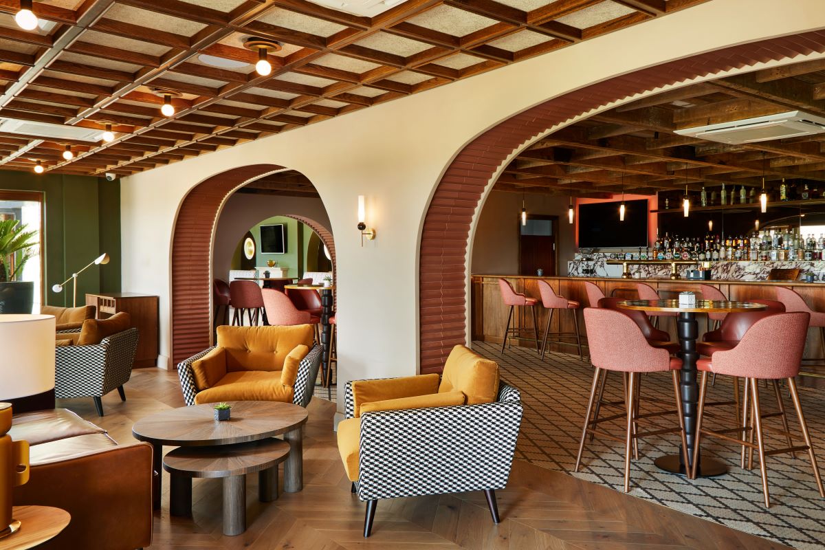 a room with chairs and tables