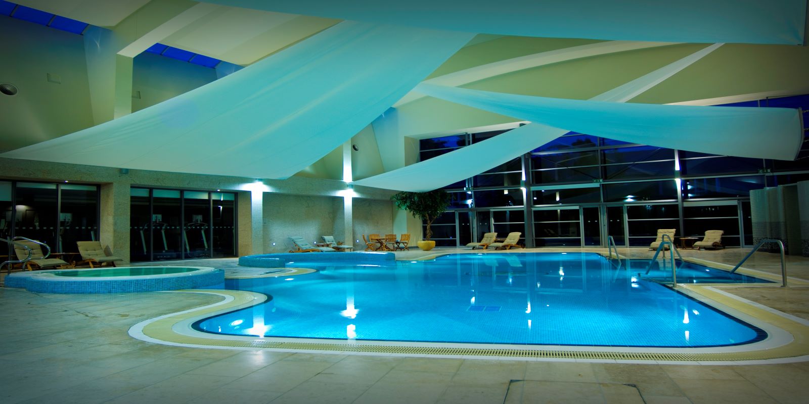 a swimming pool with a large pool