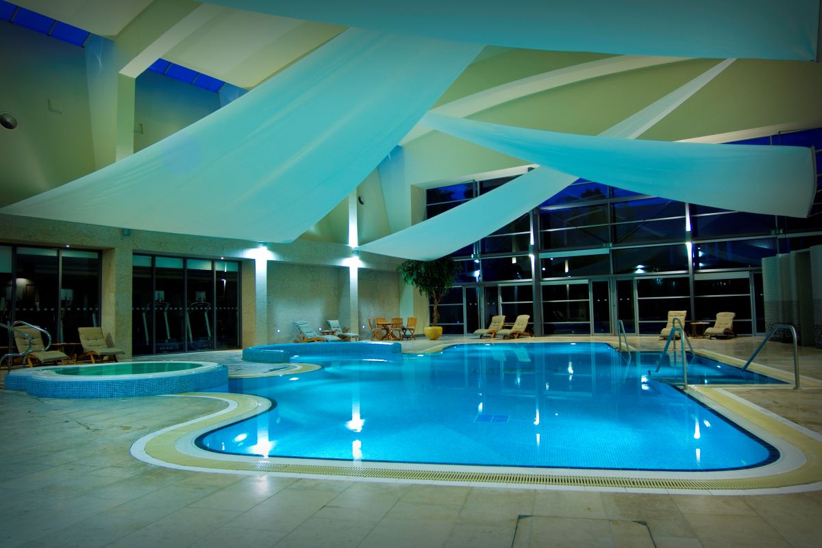 a swimming pool inside a building