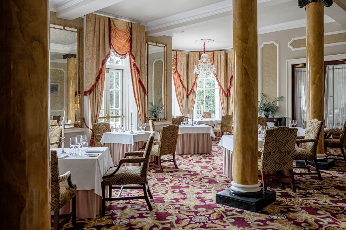 a room with tables and chairs