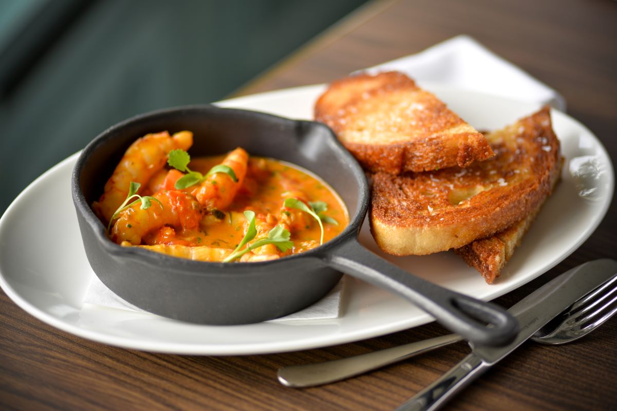 a plate of food with a fork and knife