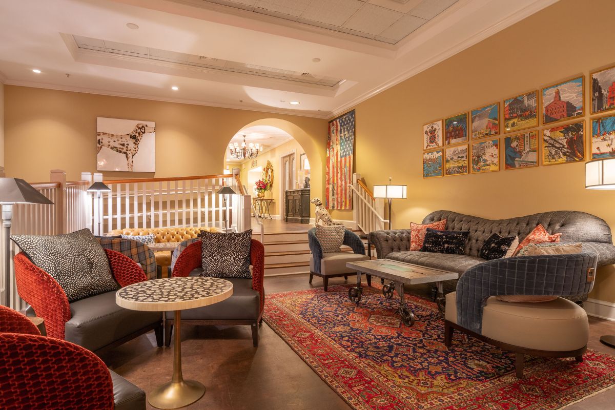 a room with couches and tables