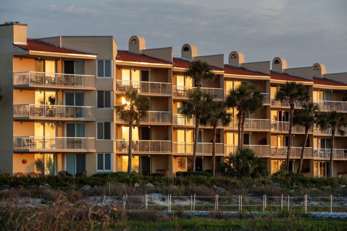 a building with palm trees