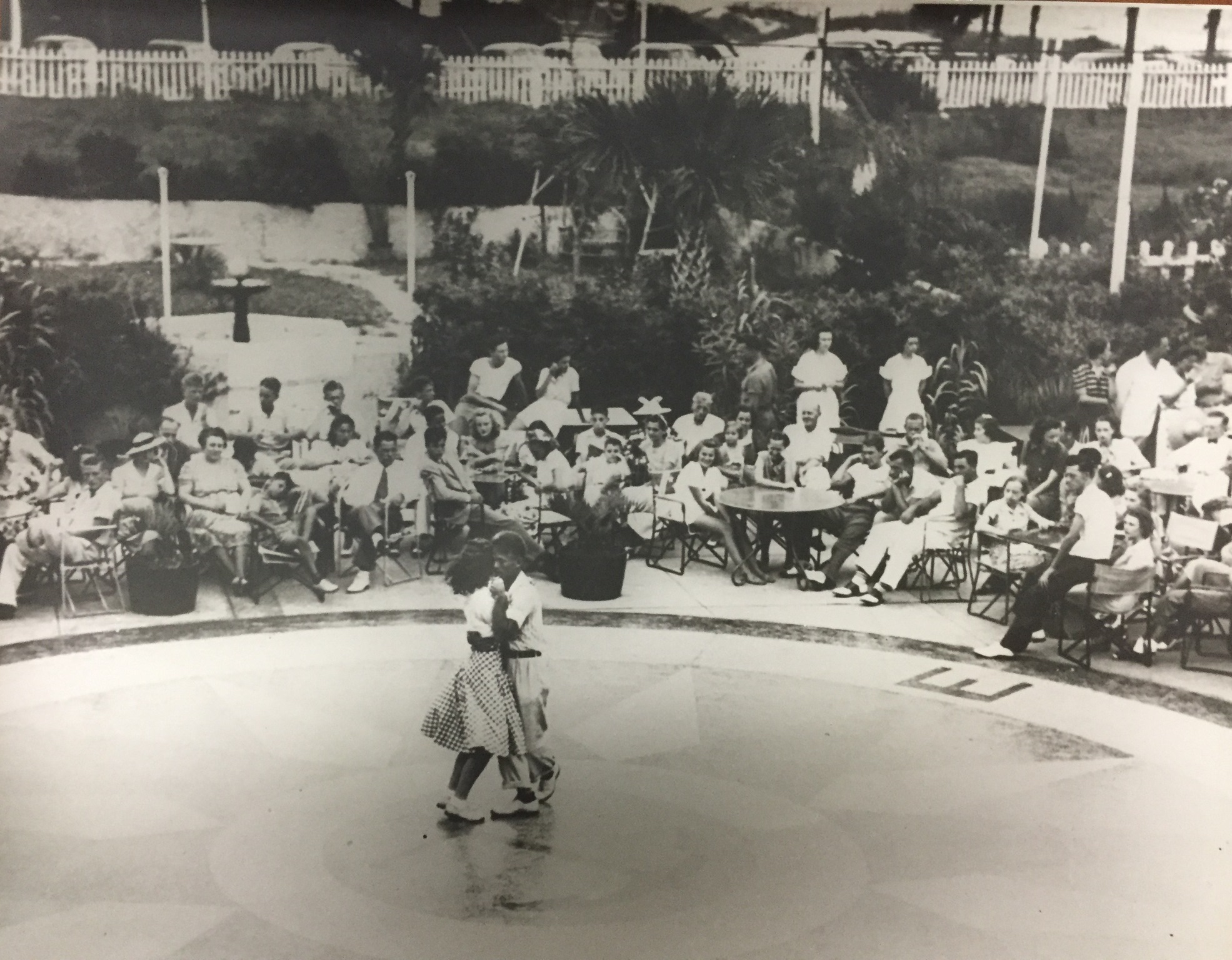 a group of people sitting around a circle