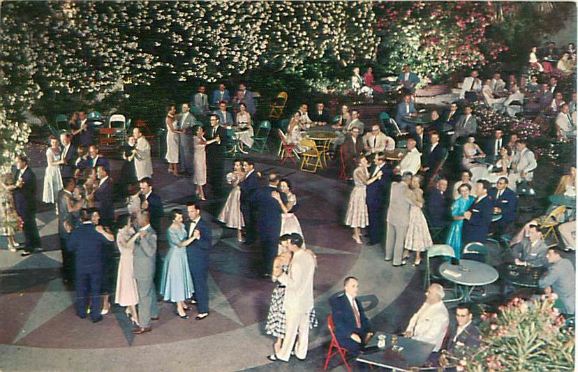 a group of people dancing outside