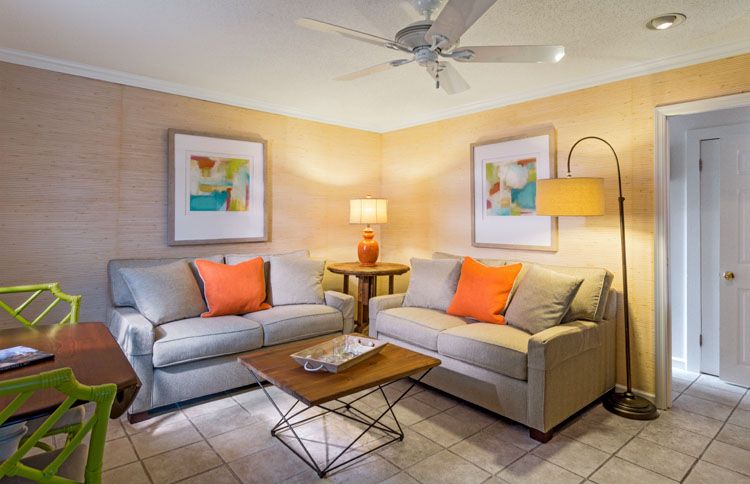 a living room with couches and a table