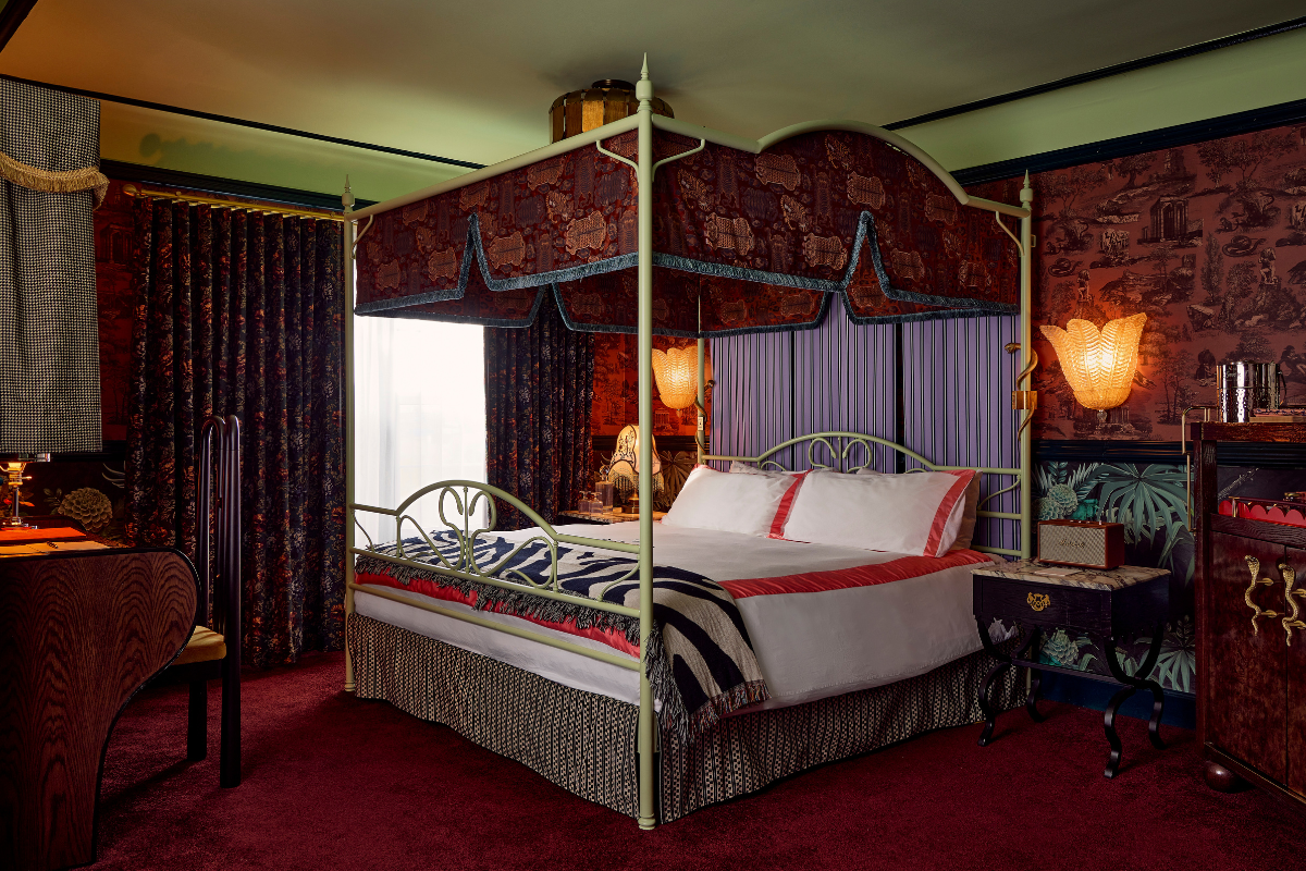 a bed with a canopy over it