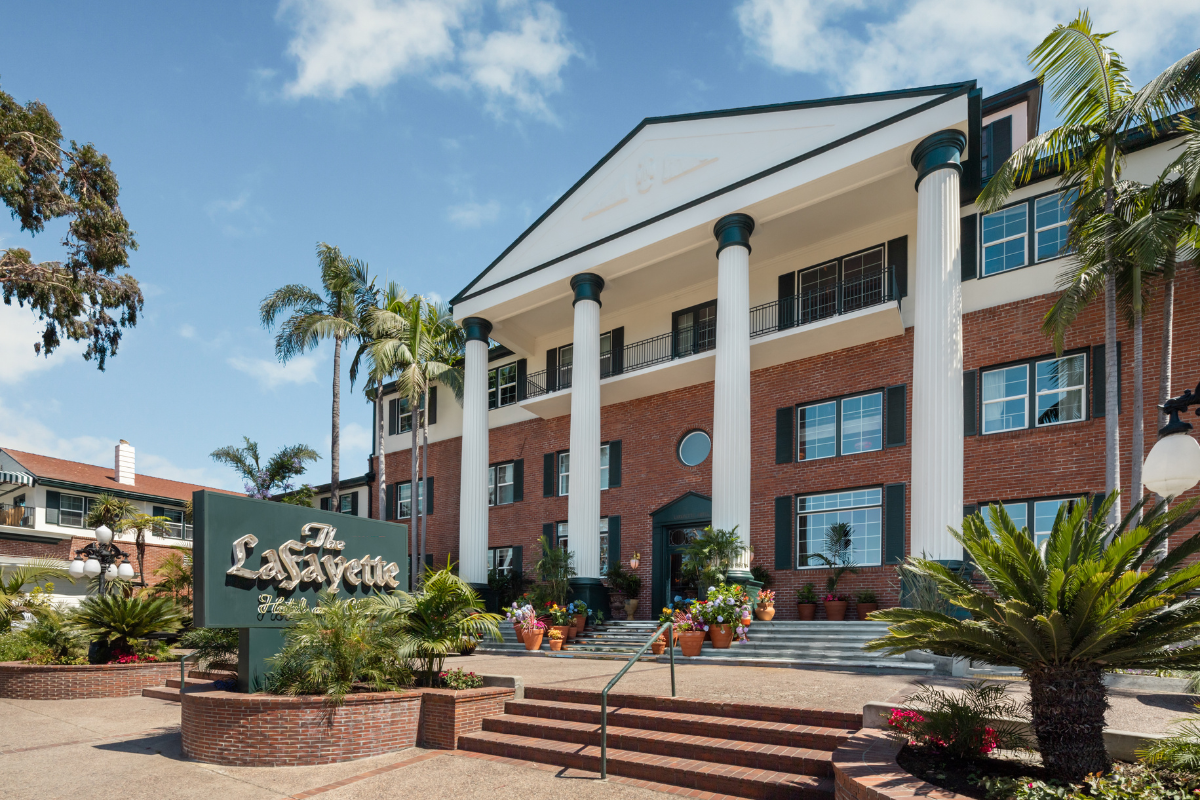 a building with columns and a sign