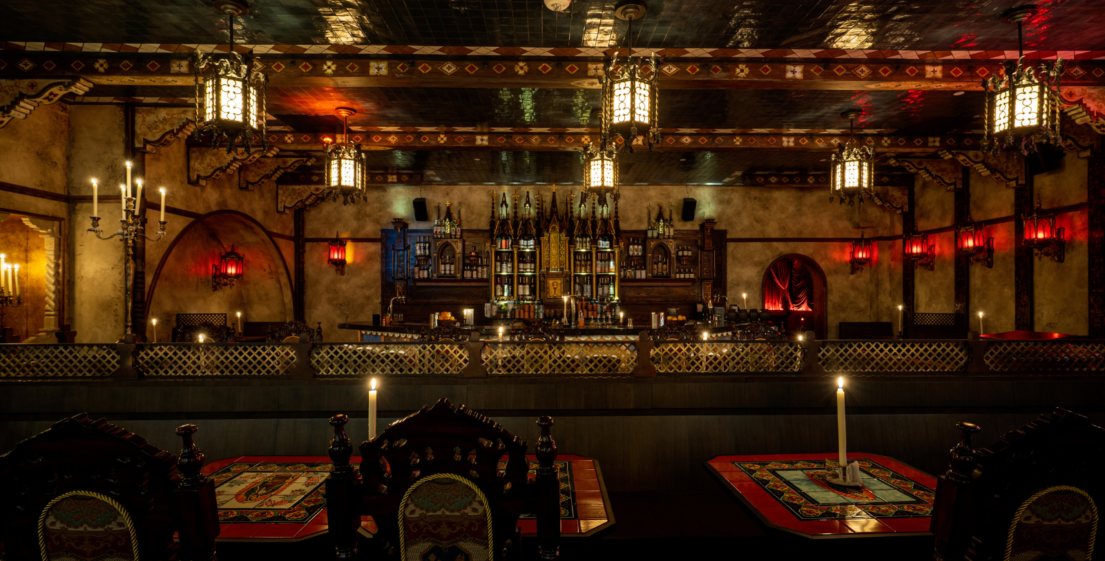 a bar with a table and chairs