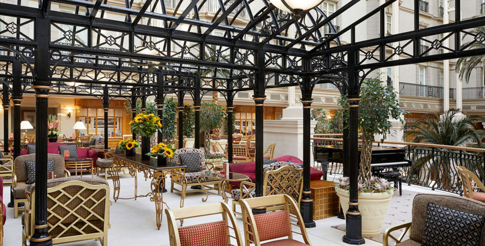 a patio area with chairs and tables