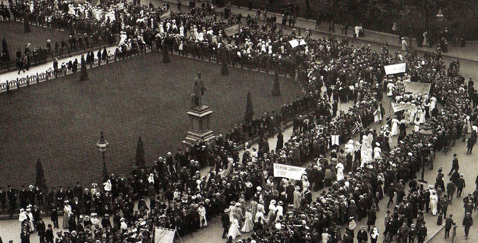 a large crowd of people in a square