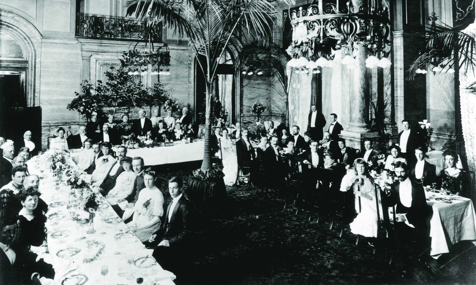 a group of people sitting at a table