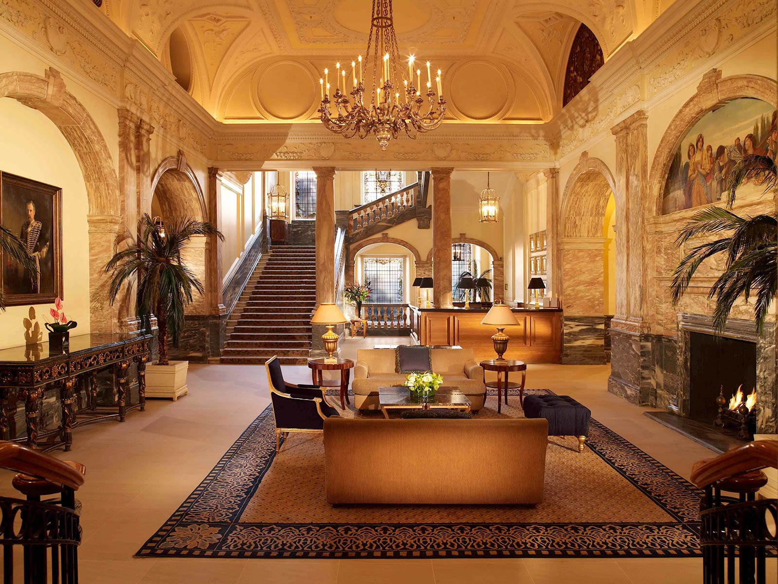 a large room with a chandelier and a couch