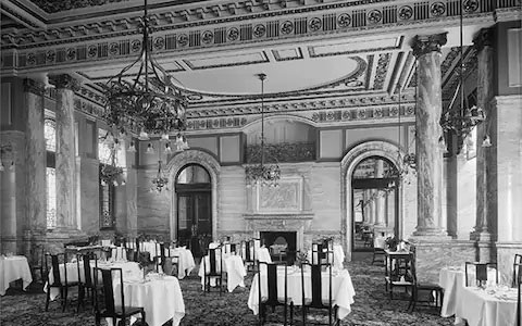 a room with tables and chairs