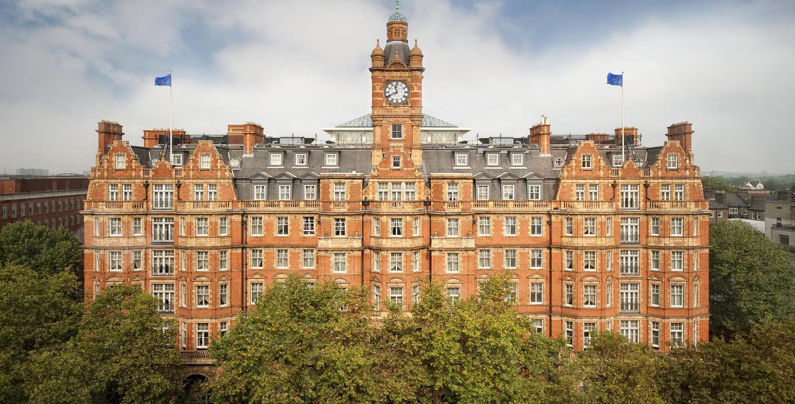 a large brick building with a clock tower