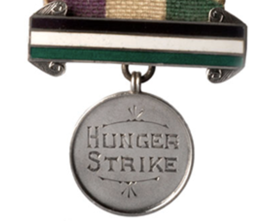 a medal with a ribbon