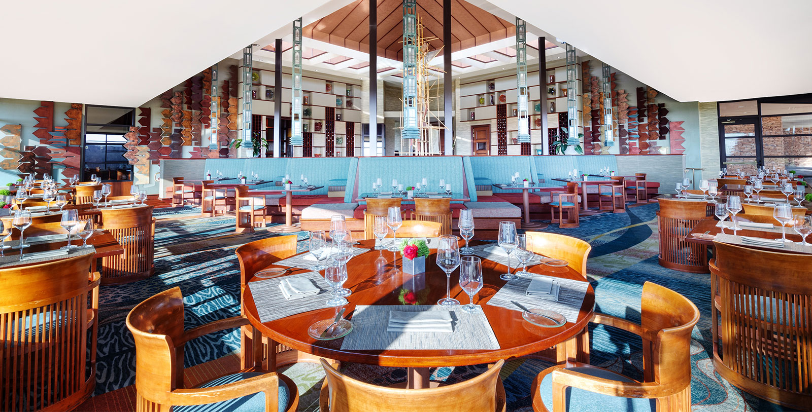a restaurant with tables and chairs
