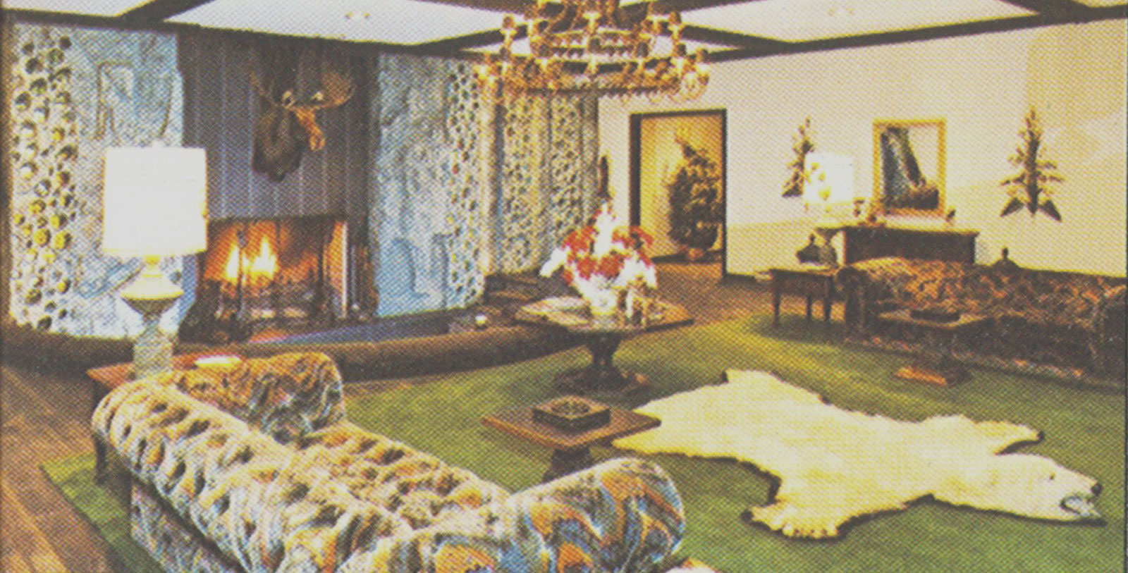 a living room with a fireplace and a couch