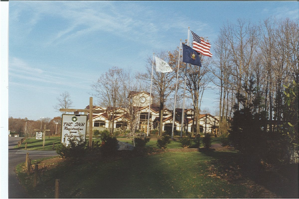 a flagpoles in front of a building