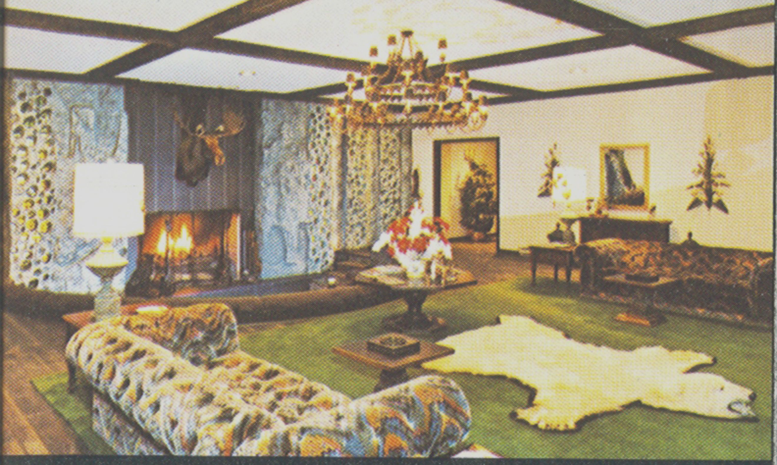 a living room with a fireplace and a couch
