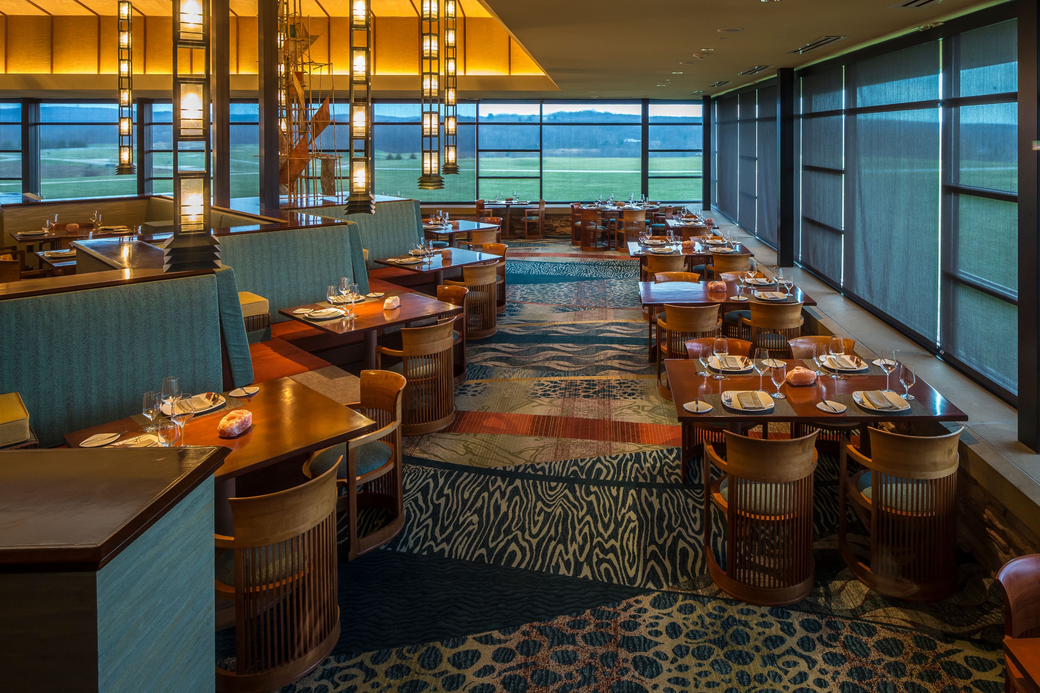 a restaurant with tables and chairs