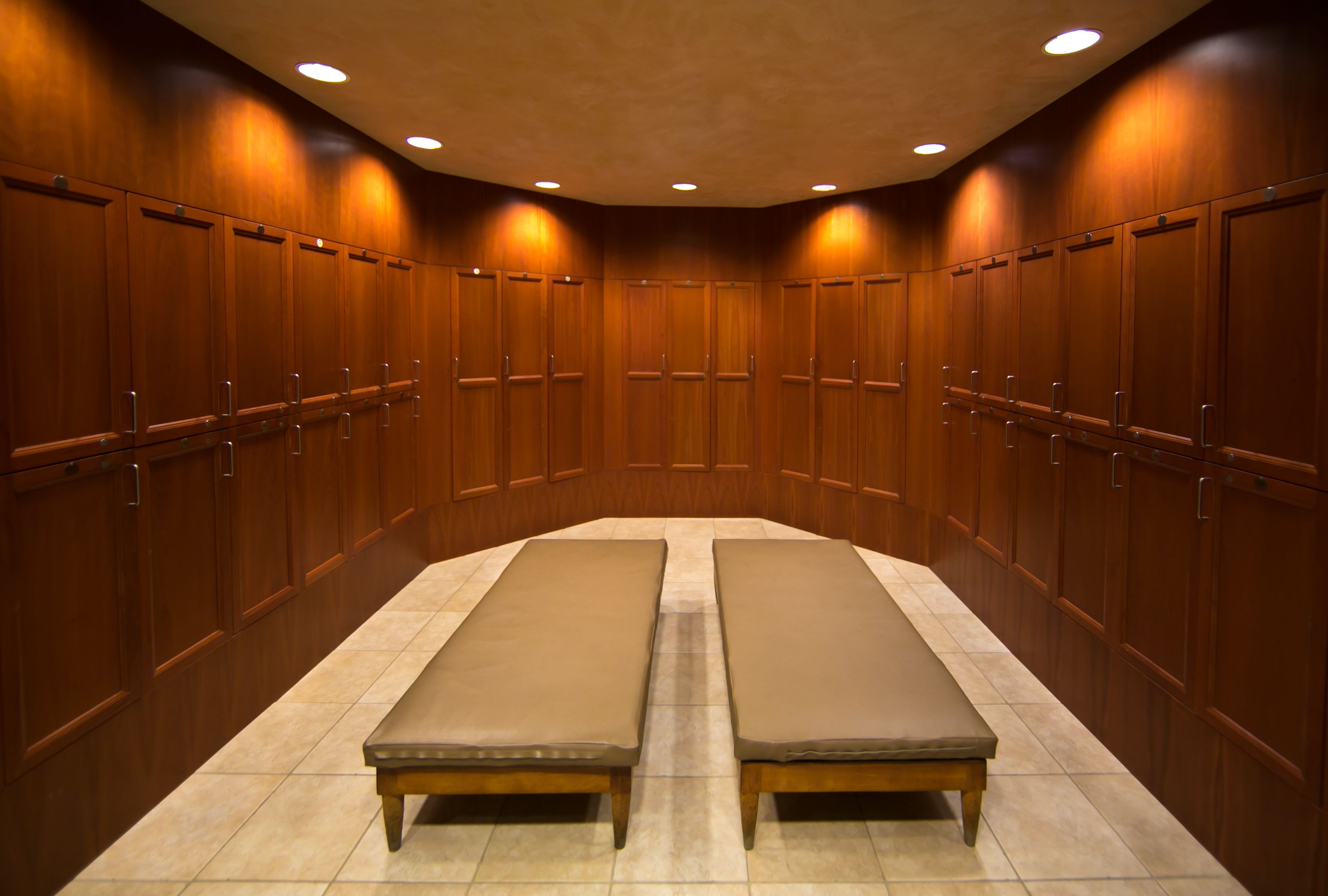 a room with benches and cabinets