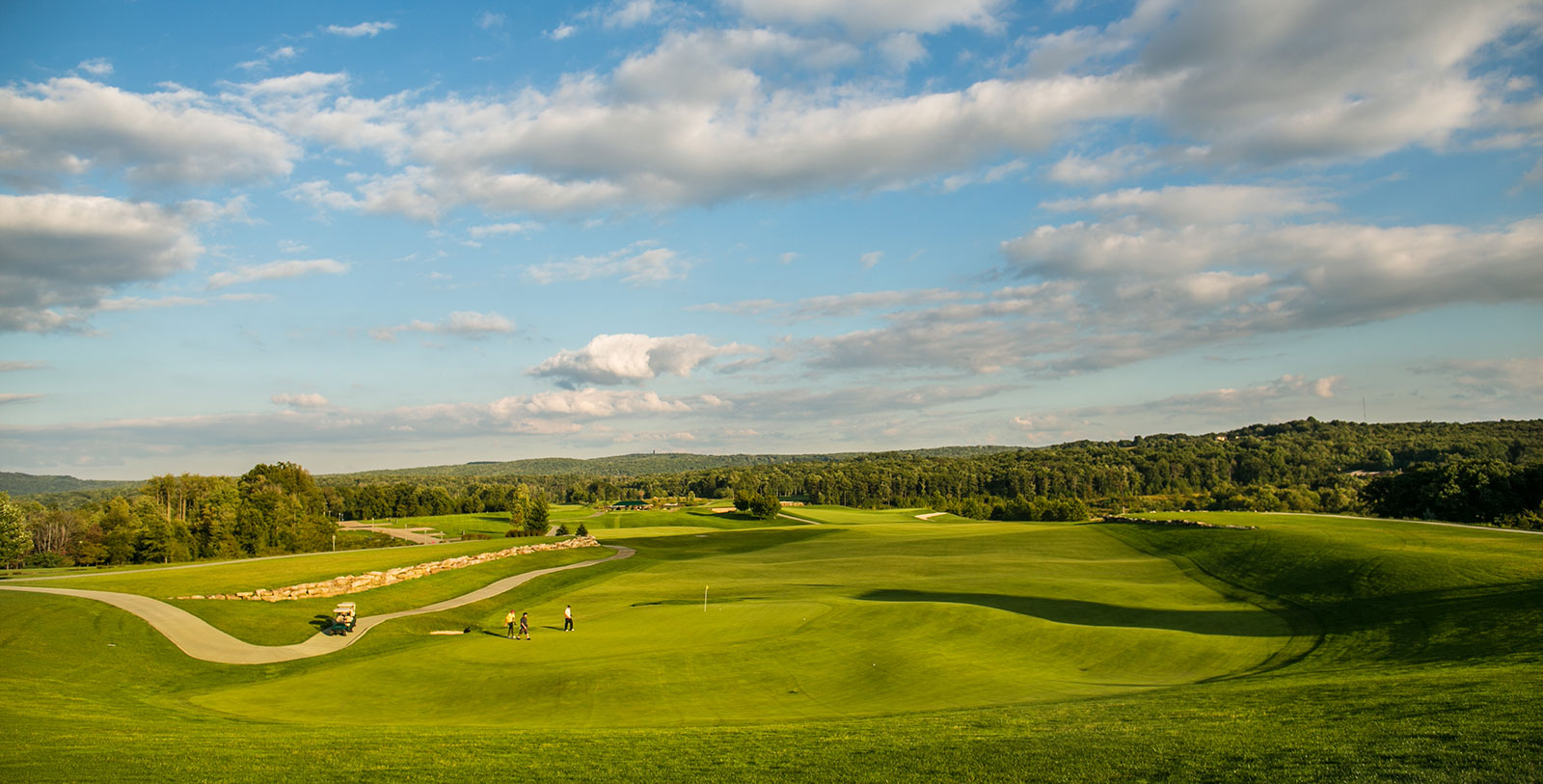 a group of people on a golf course