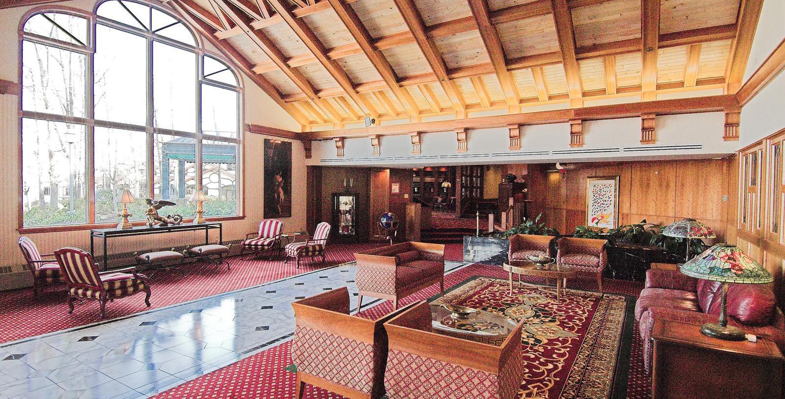 a room with red and white furniture