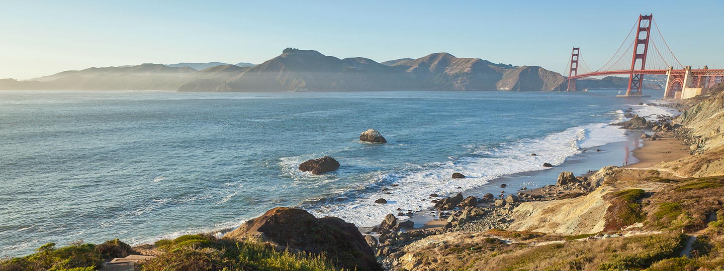 a beach with rocks and water