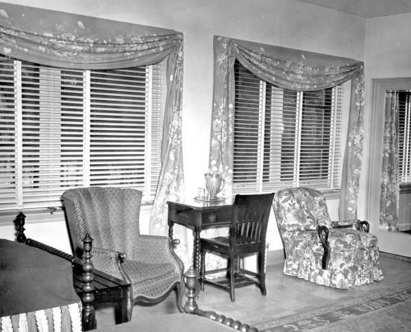a room with chairs and a table