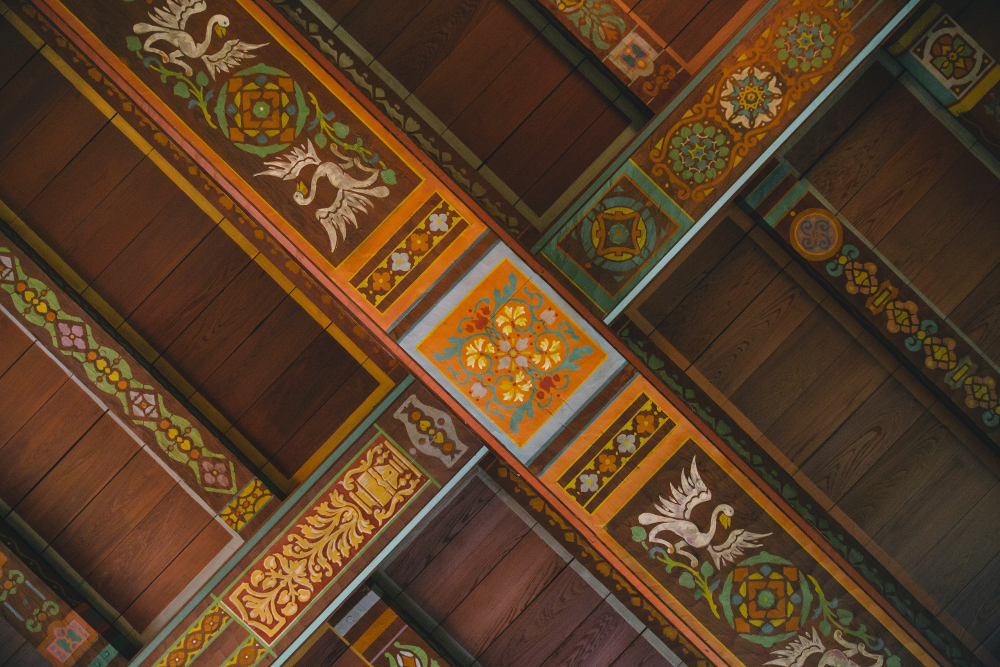 a painted wood and wood beams
