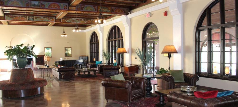 a room with a large ceiling and a large window