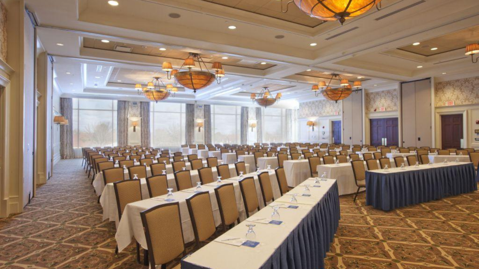 a room with tables and chairs