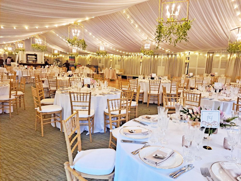a large room with tables and chairs