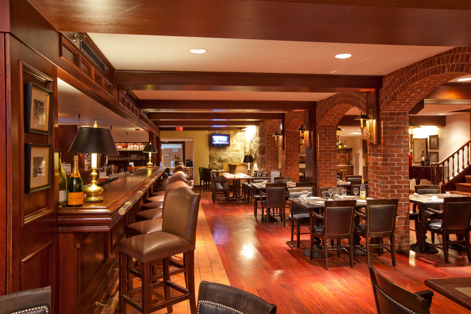 a restaurant with tables and chairs