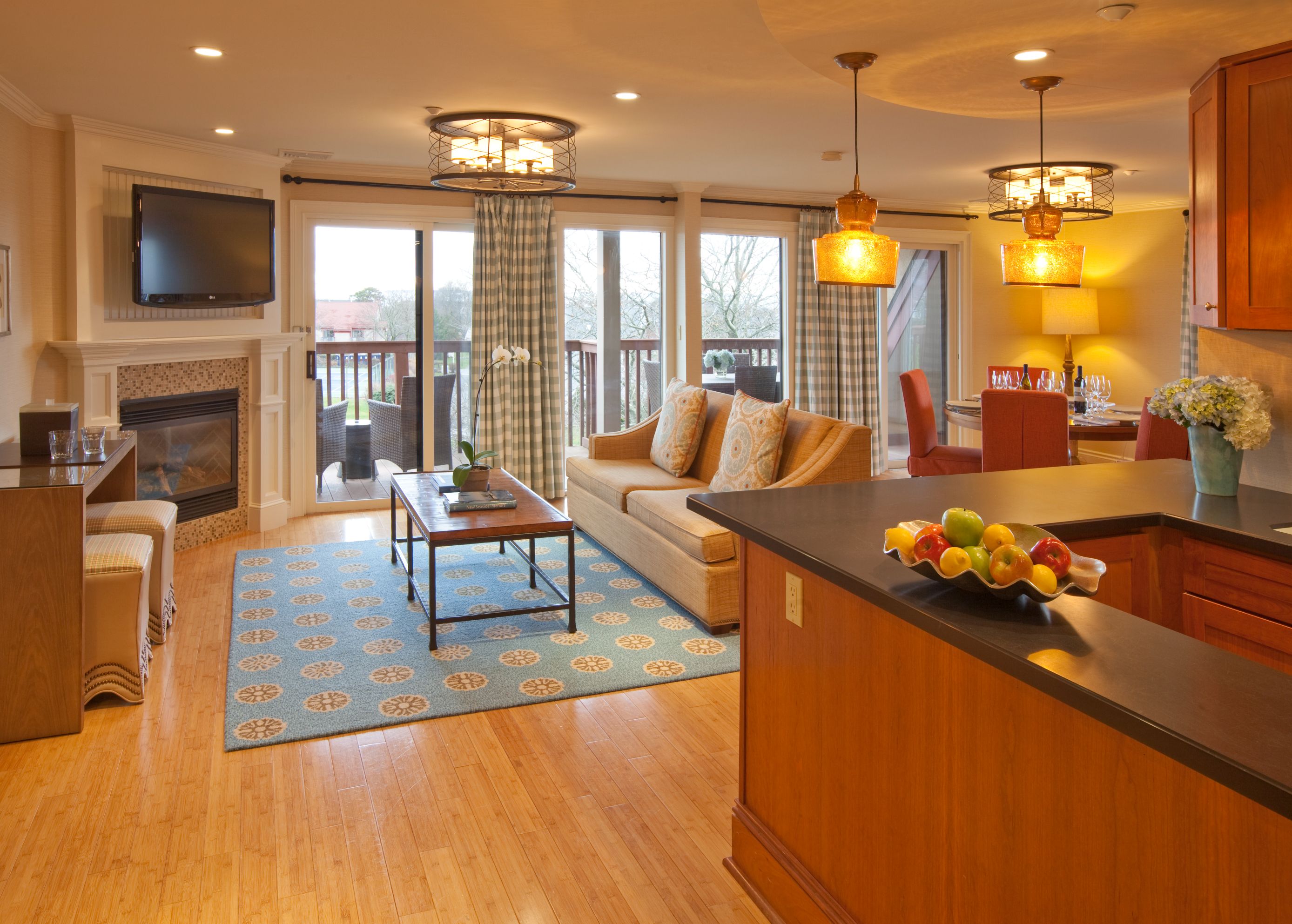 a living room with a fireplace and a couch