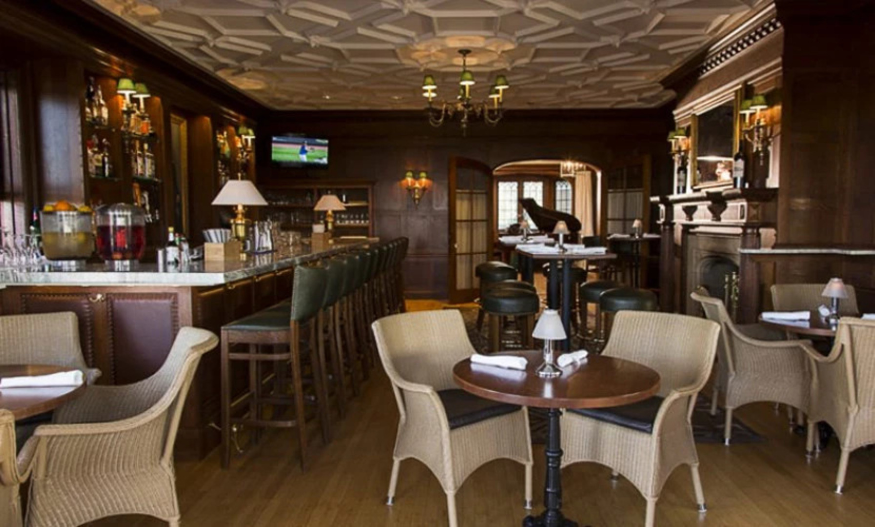 a bar with chairs and tables