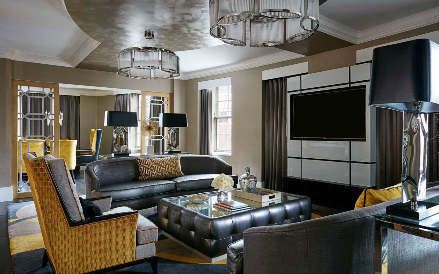 a living room with a television and couches