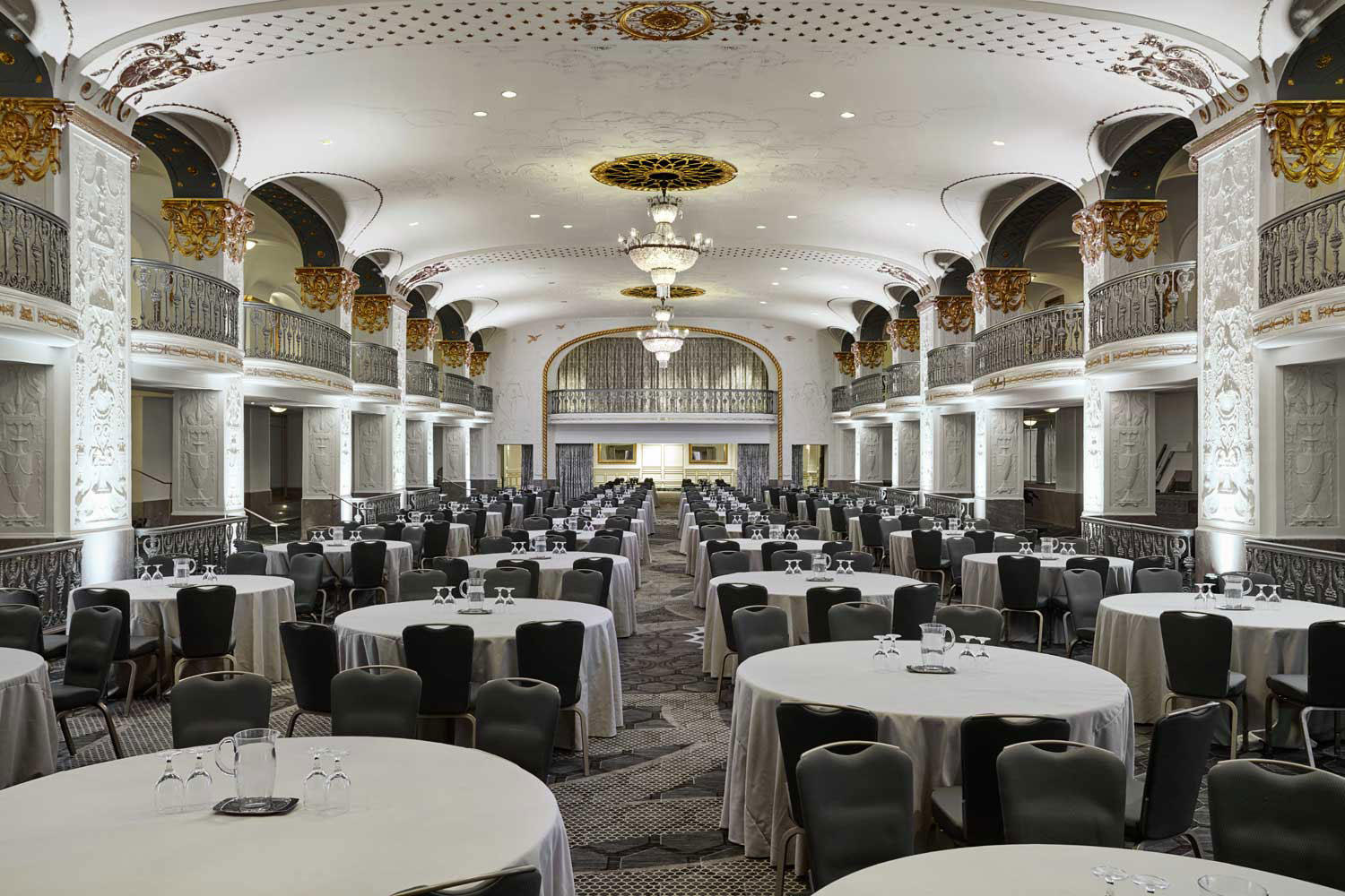 a room with tables and chairs