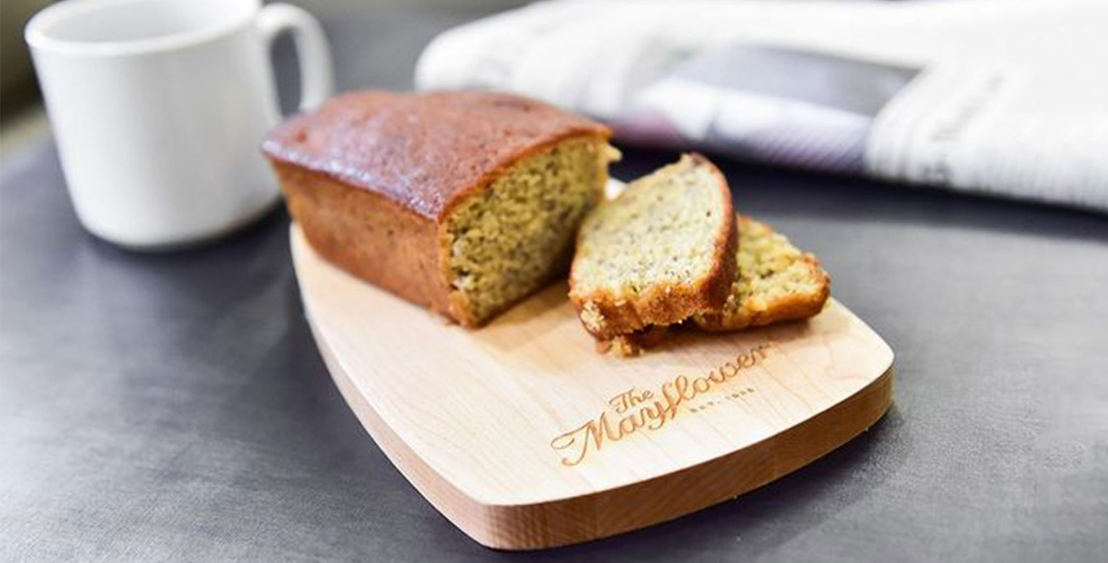 a loaf of bread on a wooden board