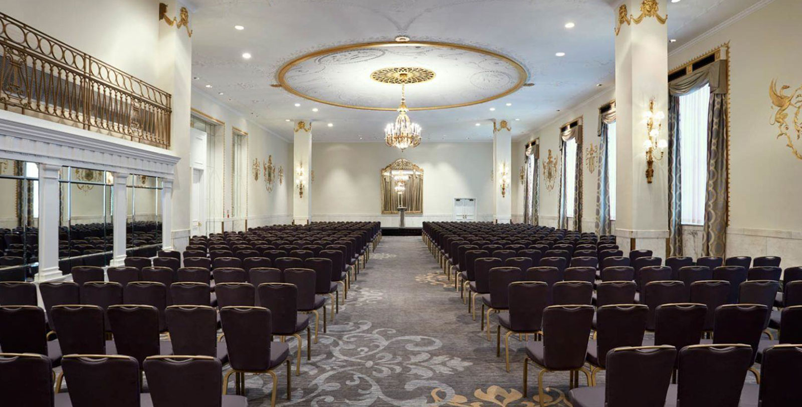 a room with rows of chairs