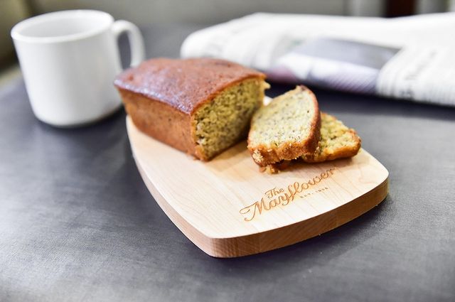 a loaf of bread on a wooden board