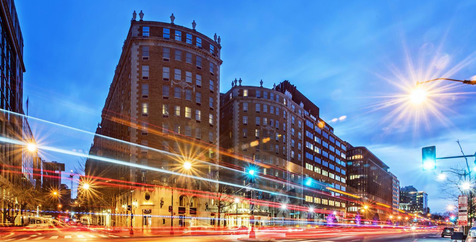 a city street with cars and buildings