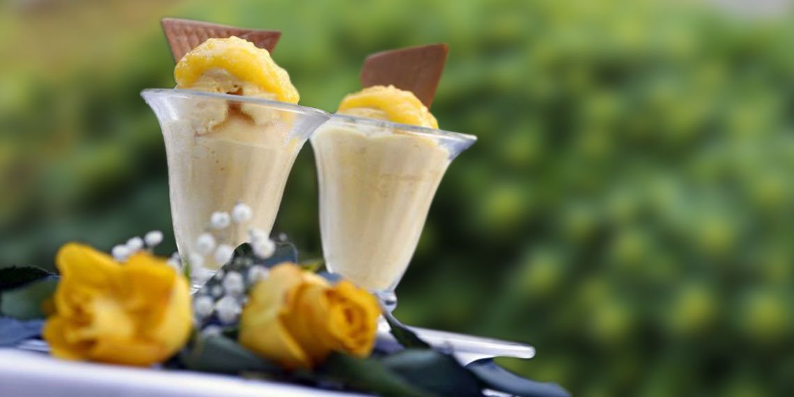 two cups of ice cream and roses