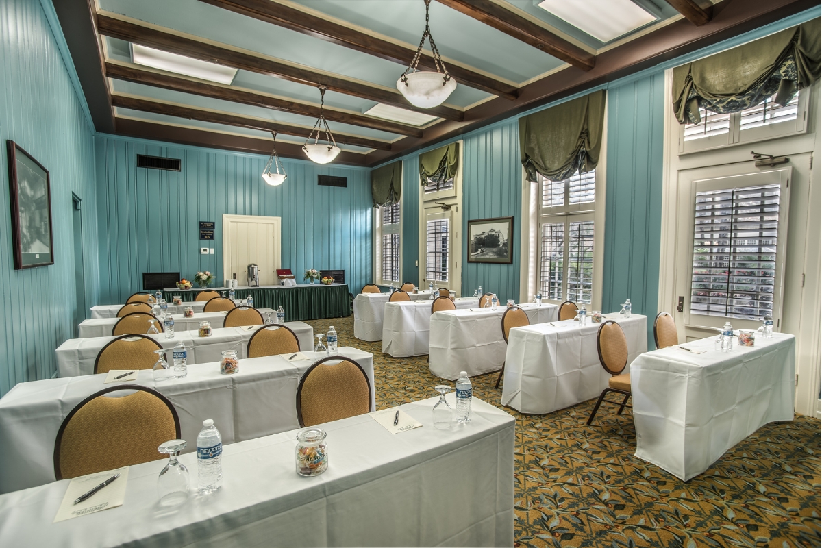 a room with tables and chairs