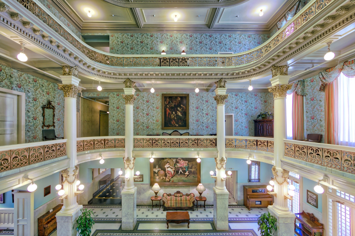 a large ornate building with a large balcony